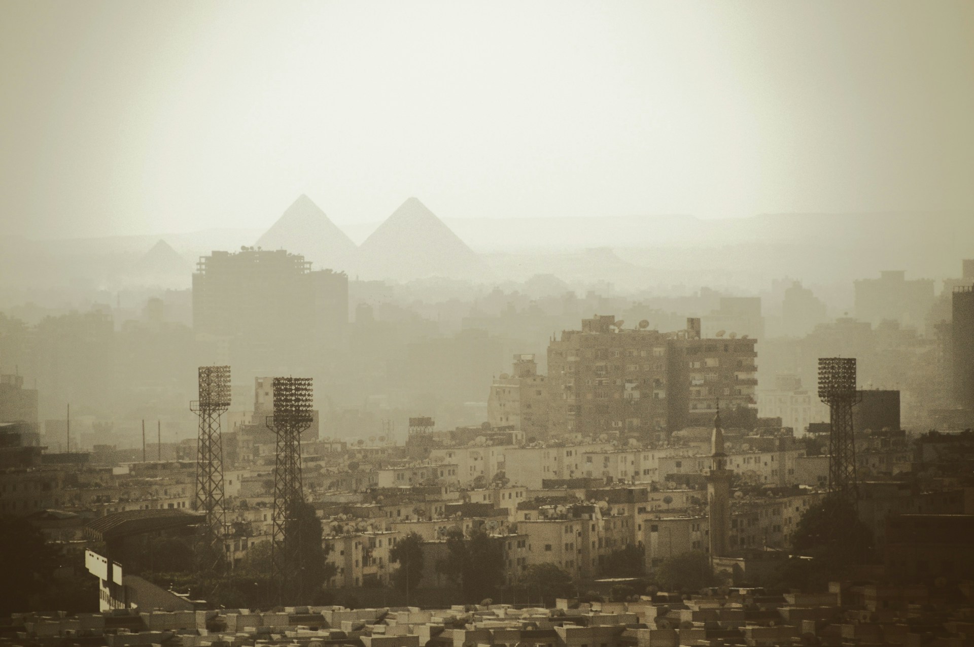 aerial photo of gray buildings near pyramids